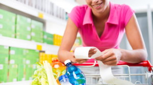 Supermarket woman checking receipt