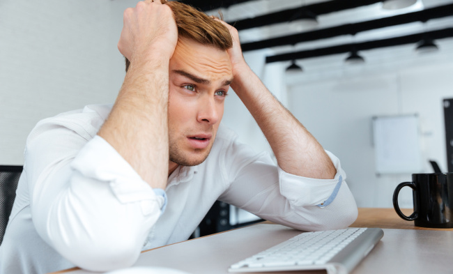 Man in front of a computer